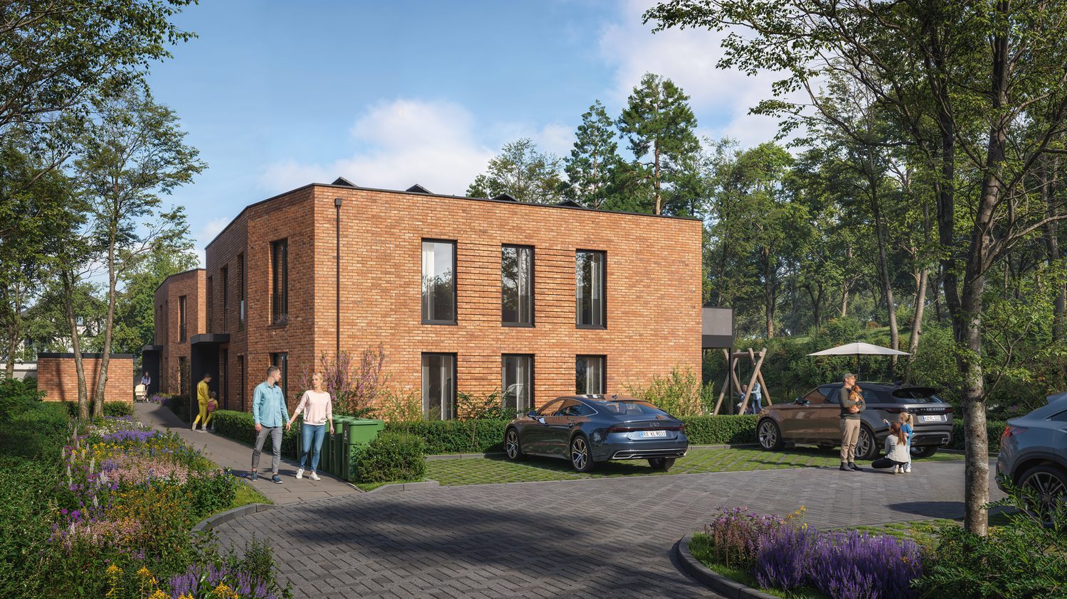Straßenansicht der beiden Neubau-Baukörper bei Tag mit PKW-Stellplätzen in Deutsch Evern